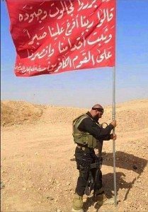 Abu plante un drapeau
