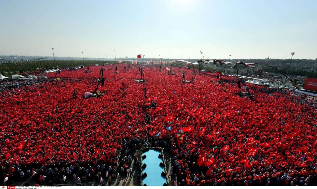 Turkish people wave flags of their country as they take part in a Democracy and Martyrs' Rally in Istanbul, Sunday, Aug. 7, 2016. More than 1 million flag-waving Turks gathered in Istanbul on Sunday for an anti-coup rally to mark the end of nightly demonstrations since the July 15 abortive military insurrection that left more than 270 people dead (Kayhan Ozer/Presidential Press Service via AP)/IST135/865340449511/1608071959