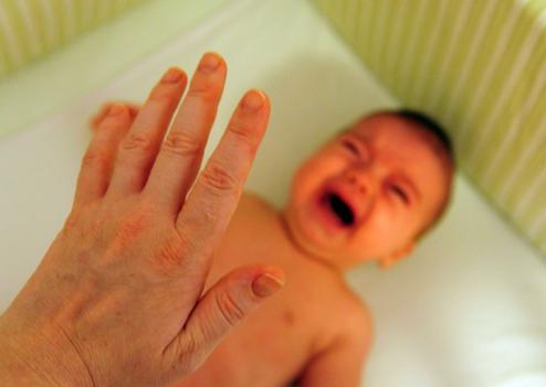 Photo Illustration of infant abuse by parents.Photo by Rafael Ben-Ari/Chameleons Eye Photo via Newscom/cewitness011280/1007201643